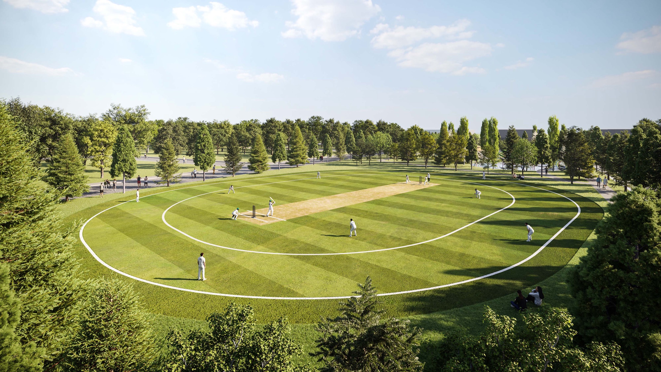 The community great lawn and cricket oval ringed by mature trees