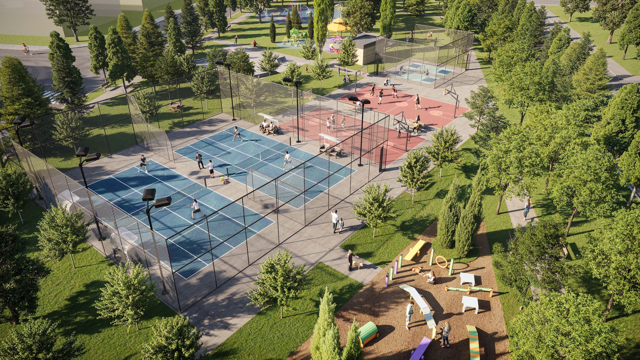 Tennis and pickleball courts beside a destination playground